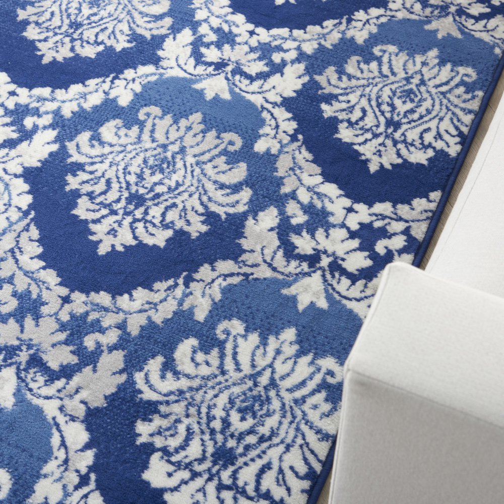 6' X 9' Blue And Ivory Damask Distressed Area Rug