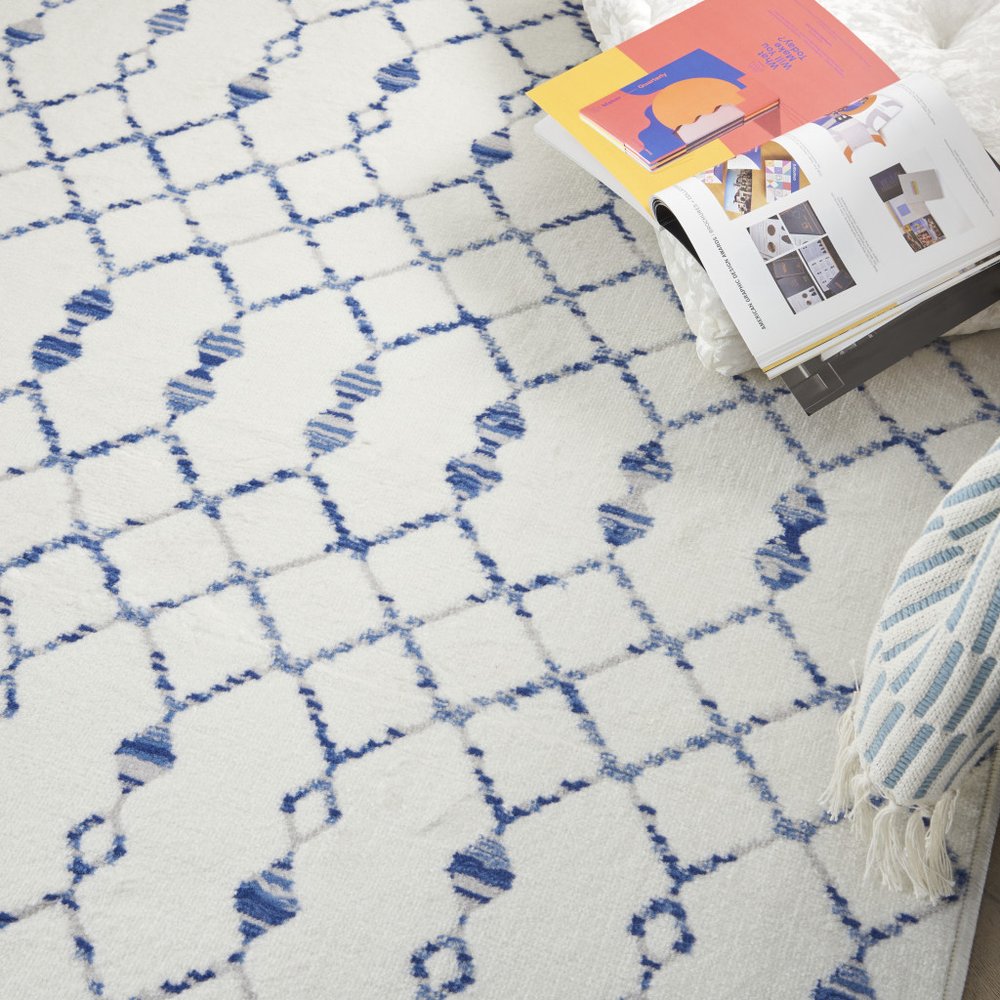 4' X 6' Ivory And Blue Geometric Area Rug