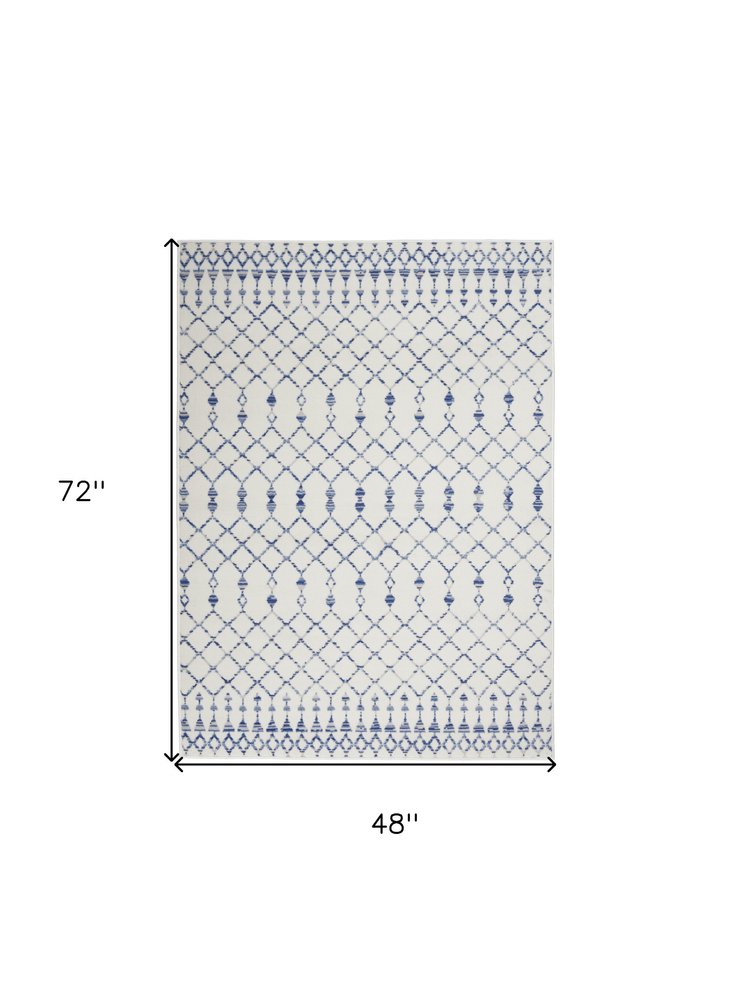4' X 6' Ivory And Blue Geometric Area Rug