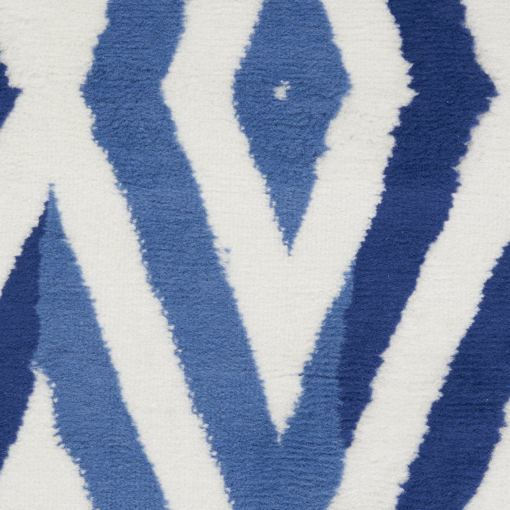 5' X 7' Ivory And Blue Geometric Area Rug