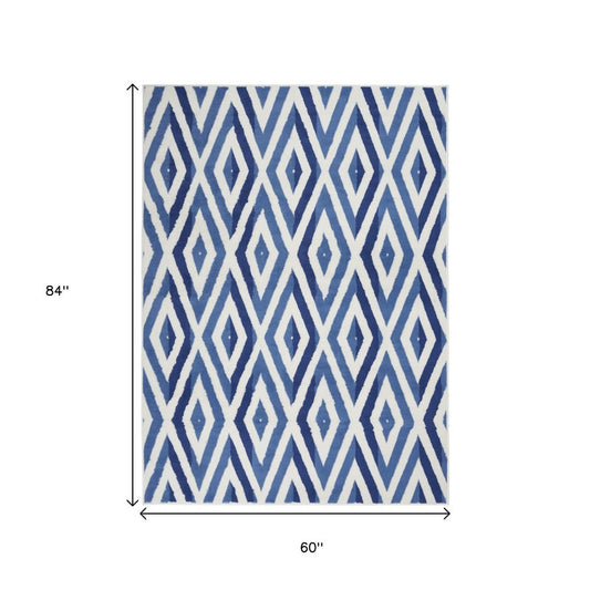 5' X 7' Ivory And Blue Geometric Area Rug