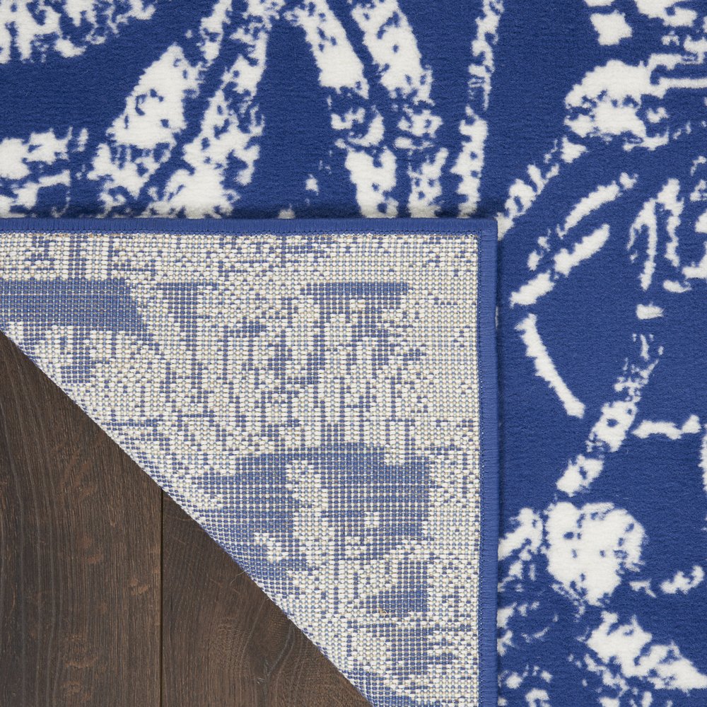 4' X 6' Navy Blue And Ivory Floral Distressed Area Rug