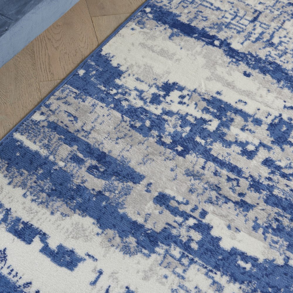 6' X 9' Ivory And Blue Ombre Distressed Area Rug