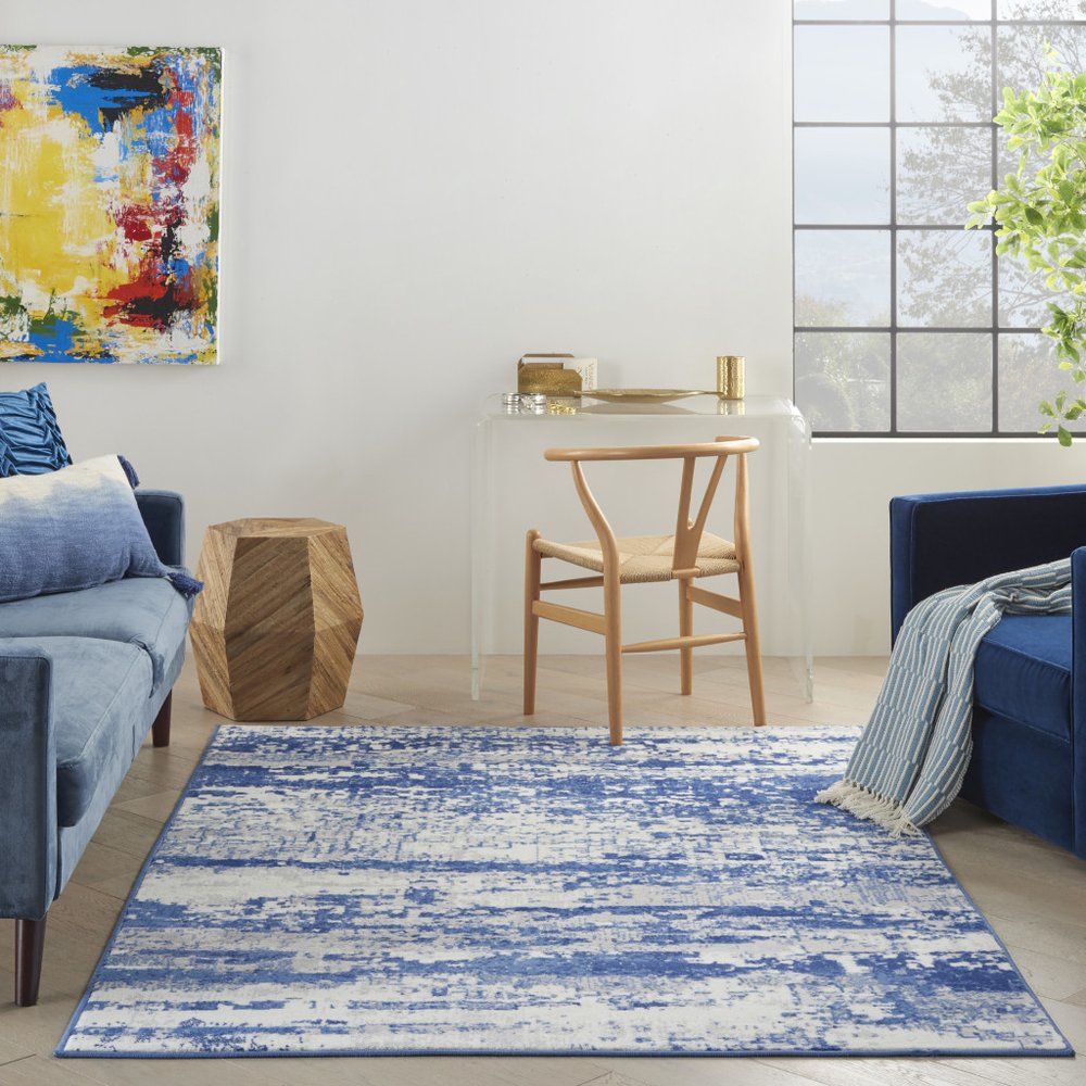 6' X 9' Ivory And Blue Ombre Distressed Area Rug