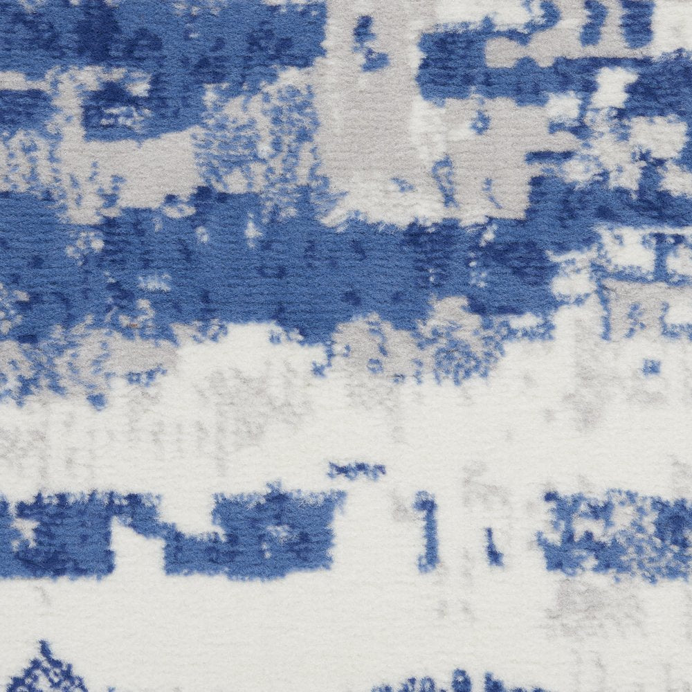 6' X 9' Ivory And Blue Ombre Distressed Area Rug