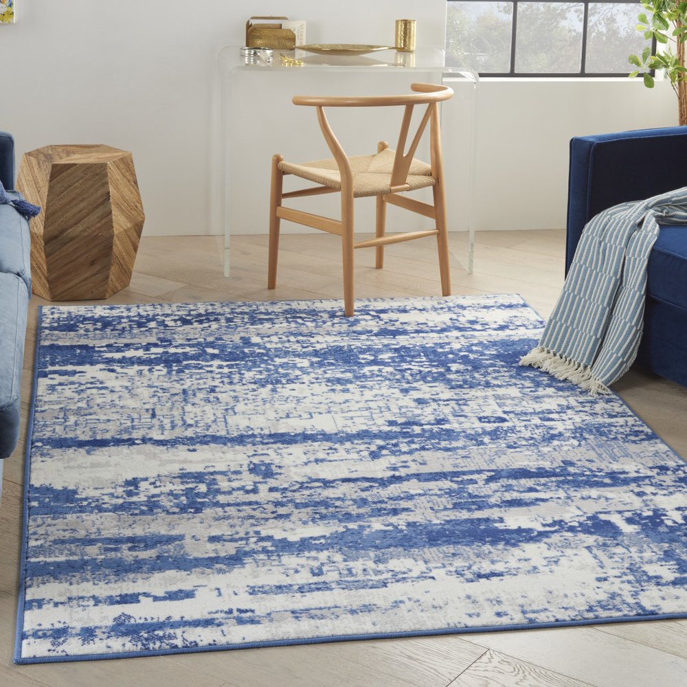 6' X 9' Ivory And Blue Ombre Distressed Area Rug