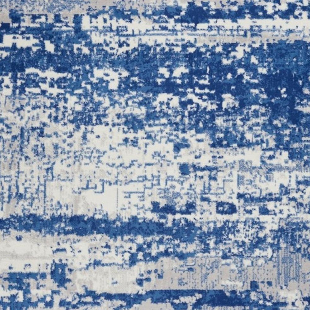 6' X 9' Ivory And Blue Ombre Distressed Area Rug