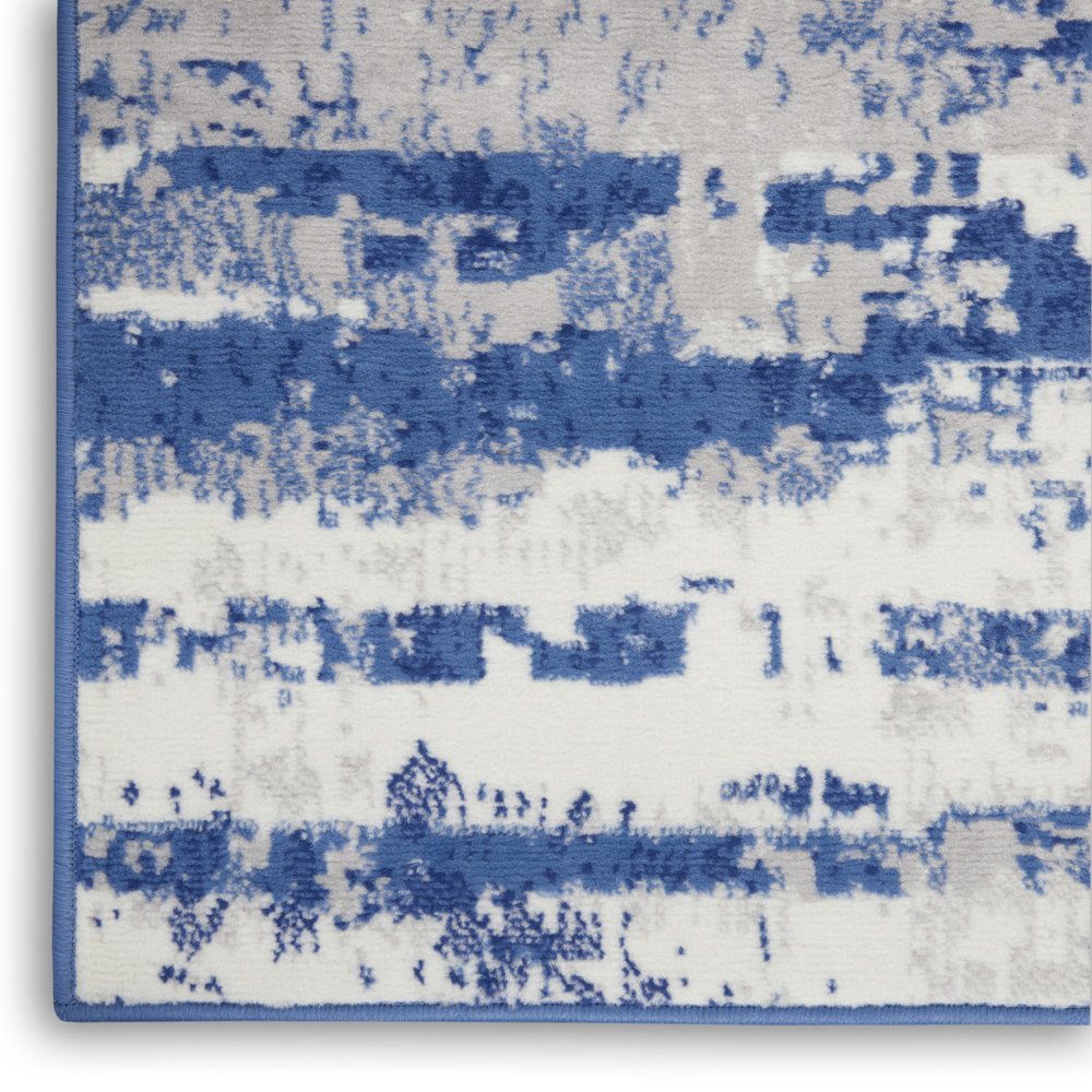 6' X 9' Ivory And Blue Ombre Distressed Area Rug