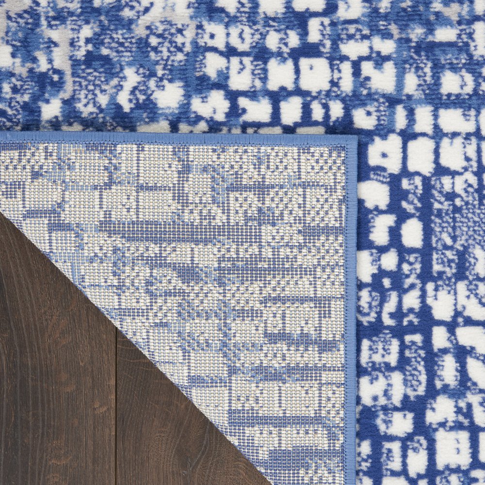 4' X 6' Ivory And Blue Geometric Area Rug