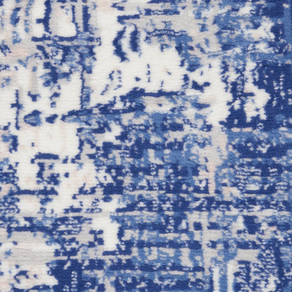 6' X 9' Blue And Ivory Abstract Distressed Area Rug