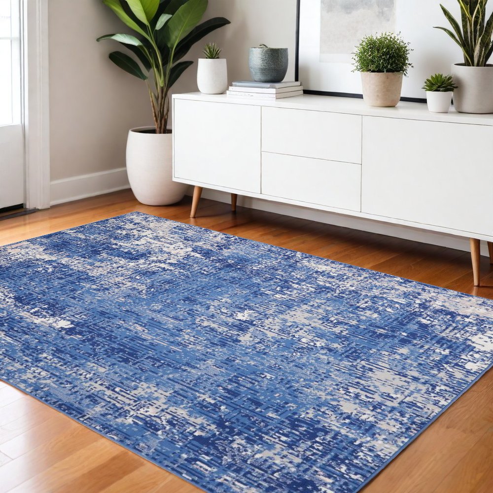 6' X 9' Blue And Ivory Abstract Distressed Area Rug