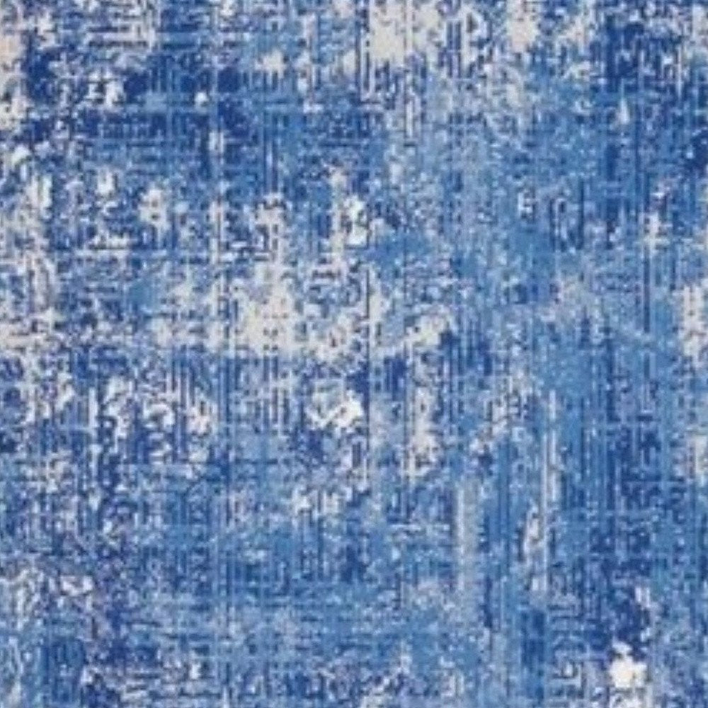 6' X 9' Blue And Ivory Abstract Distressed Area Rug