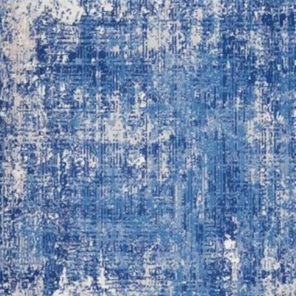 6' X 9' Blue And Ivory Abstract Distressed Area Rug