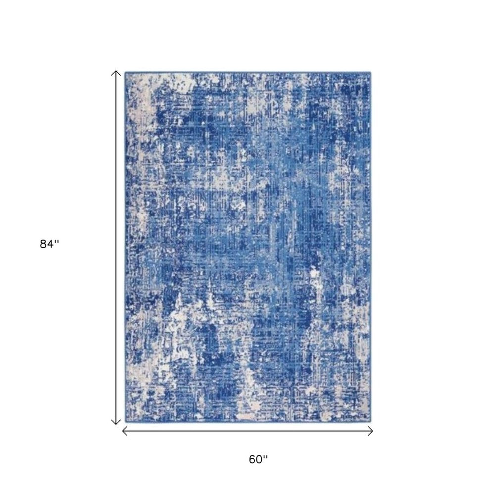 6' X 9' Blue And Ivory Abstract Distressed Area Rug
