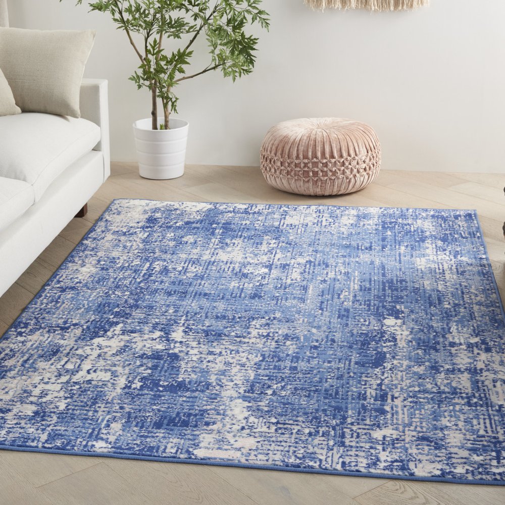 6' X 9' Blue And Ivory Abstract Distressed Area Rug