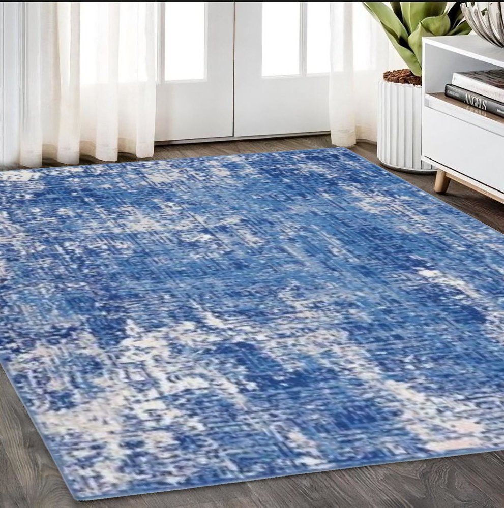 6' X 9' Blue And Ivory Abstract Distressed Area Rug