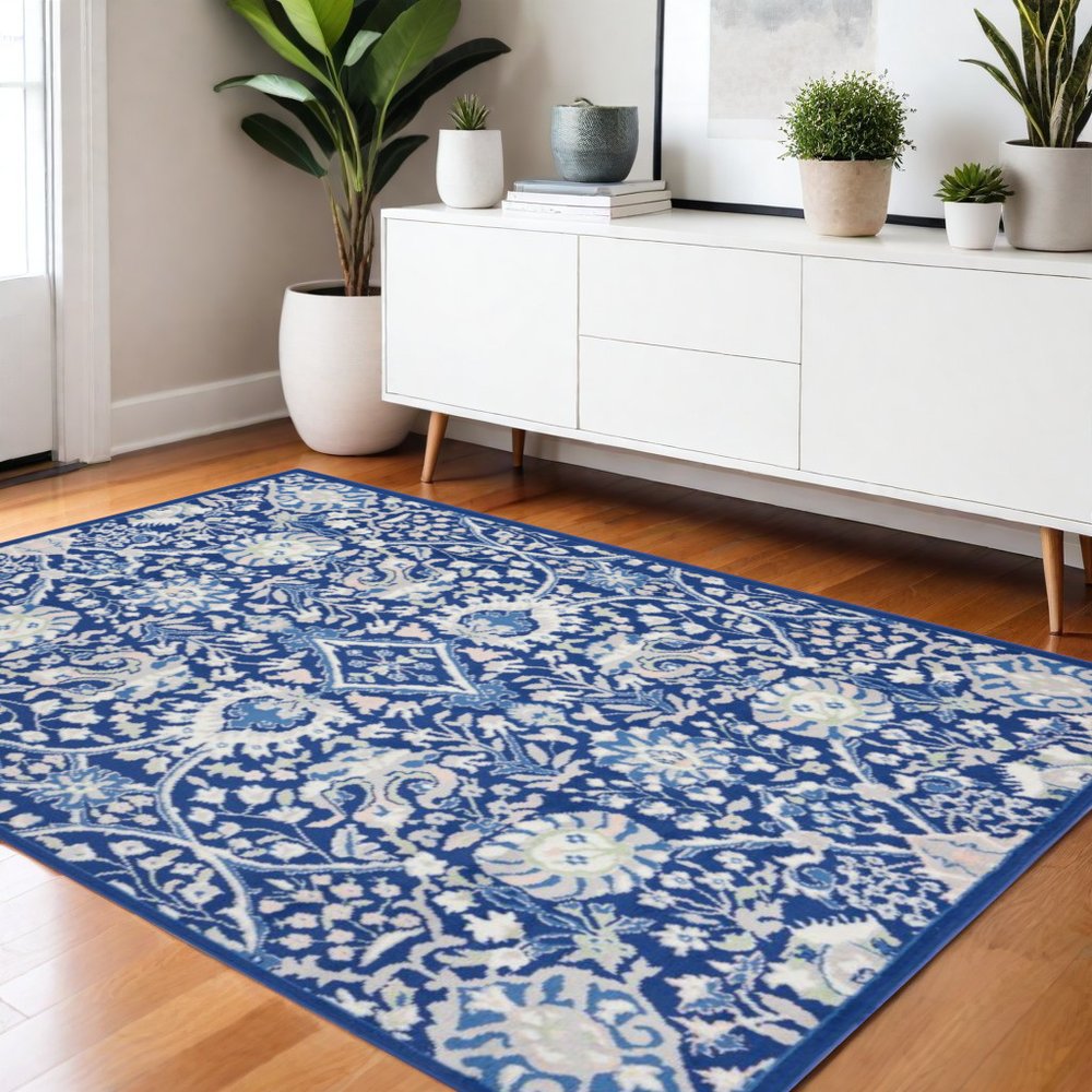 6' X 9' Blue And Ivory Floral Area Rug