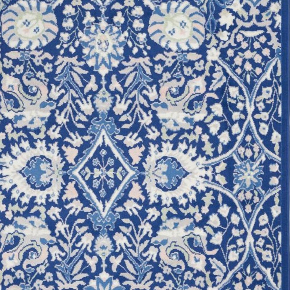 6' X 9' Blue And Ivory Floral Area Rug