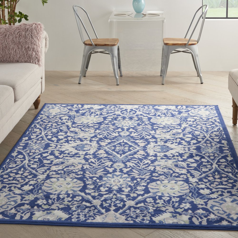 6' X 9' Blue And Ivory Floral Area Rug