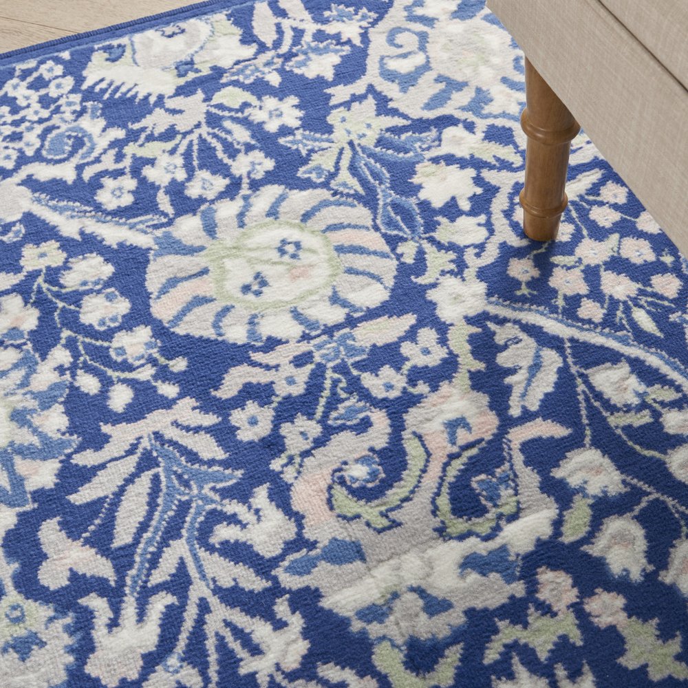 6' X 9' Blue And Ivory Floral Area Rug