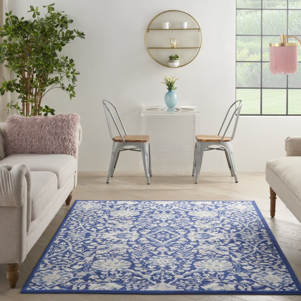 6' X 9' Blue And Ivory Floral Area Rug