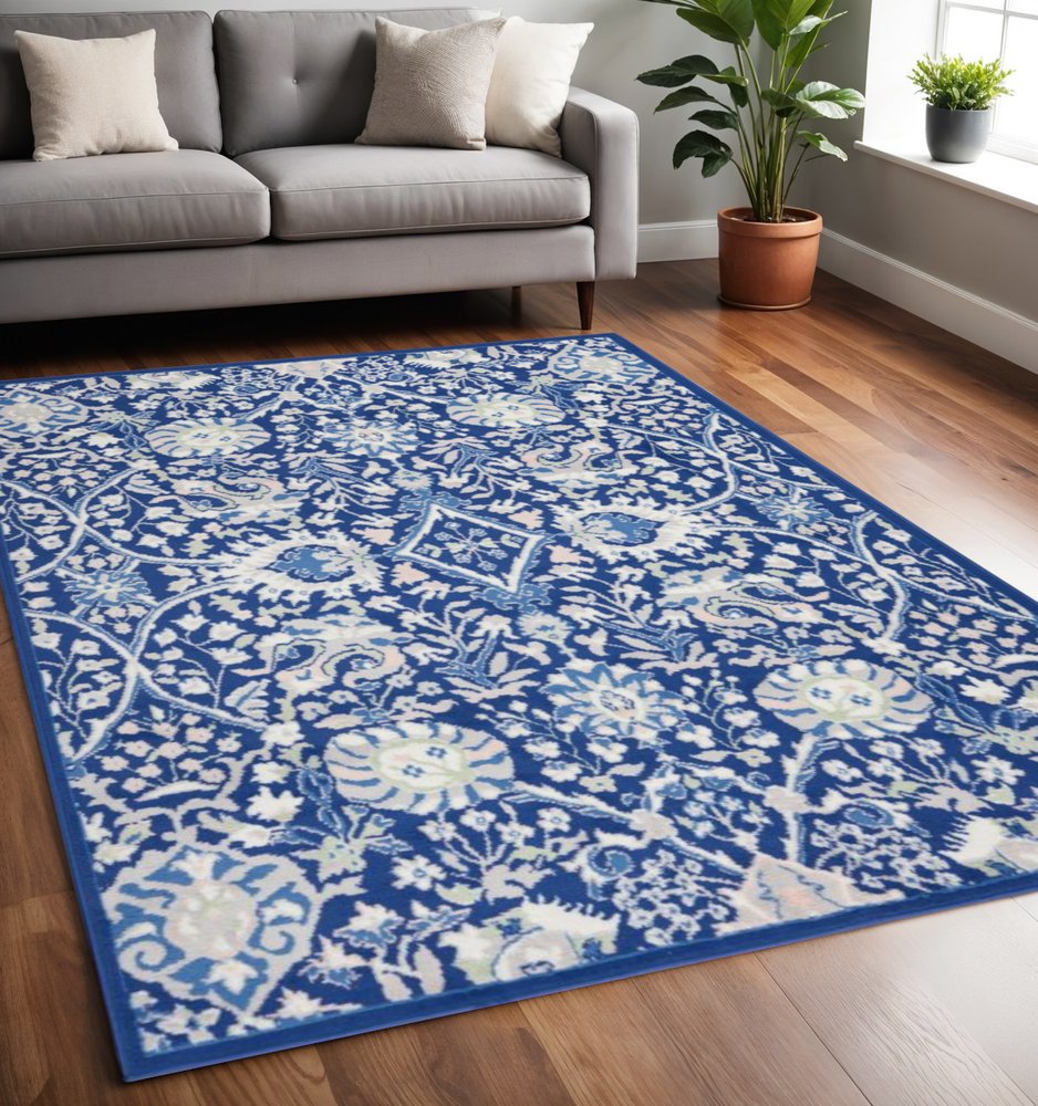 6' X 9' Blue And Ivory Floral Area Rug