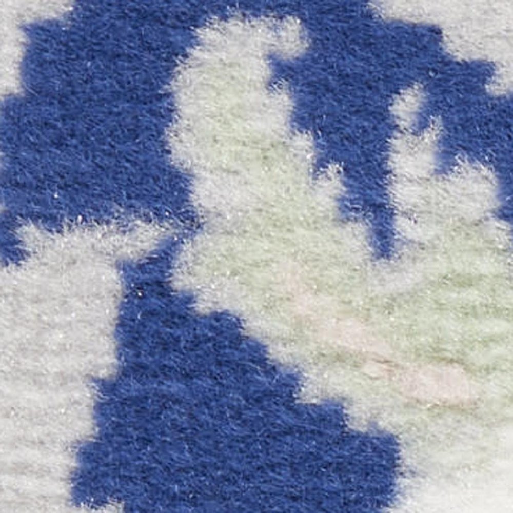 6' X 9' Blue And Ivory Floral Area Rug