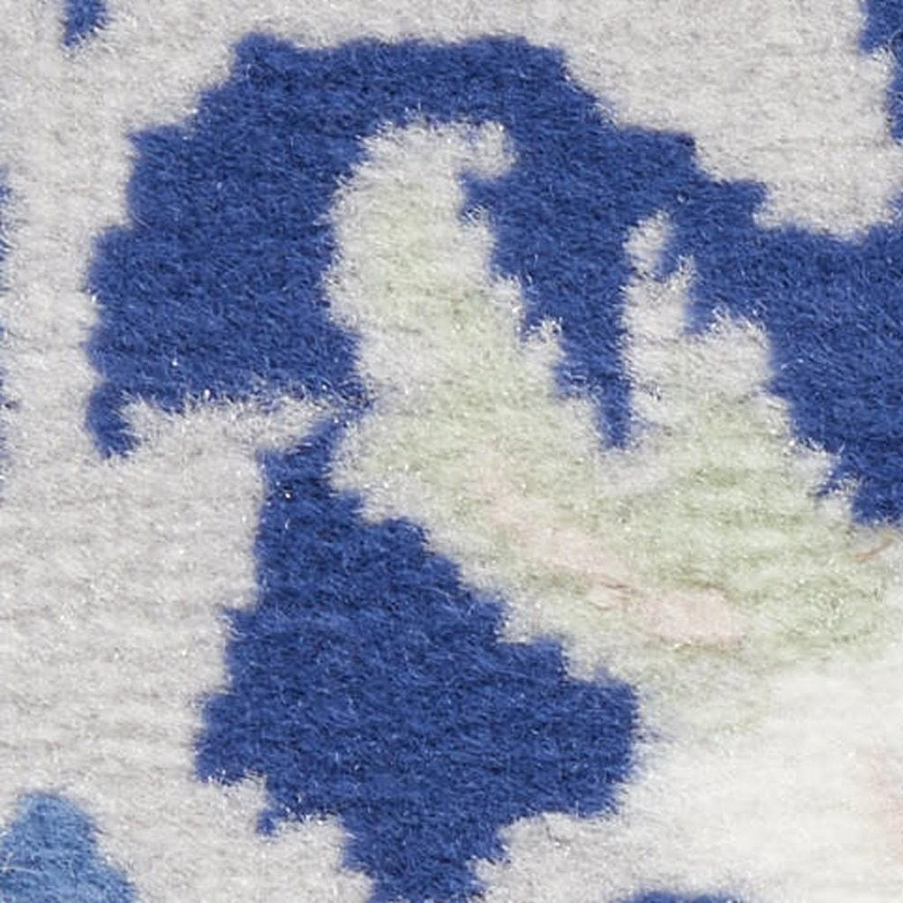 6' X 9' Blue And Ivory Floral Area Rug