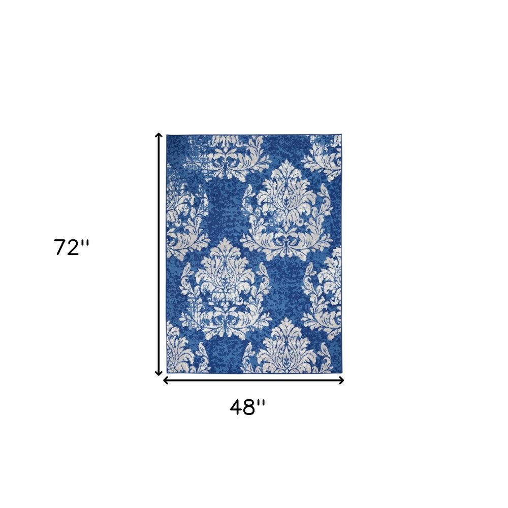 4' X 6' Ivory And Blue Damask Distressed Area Rug
