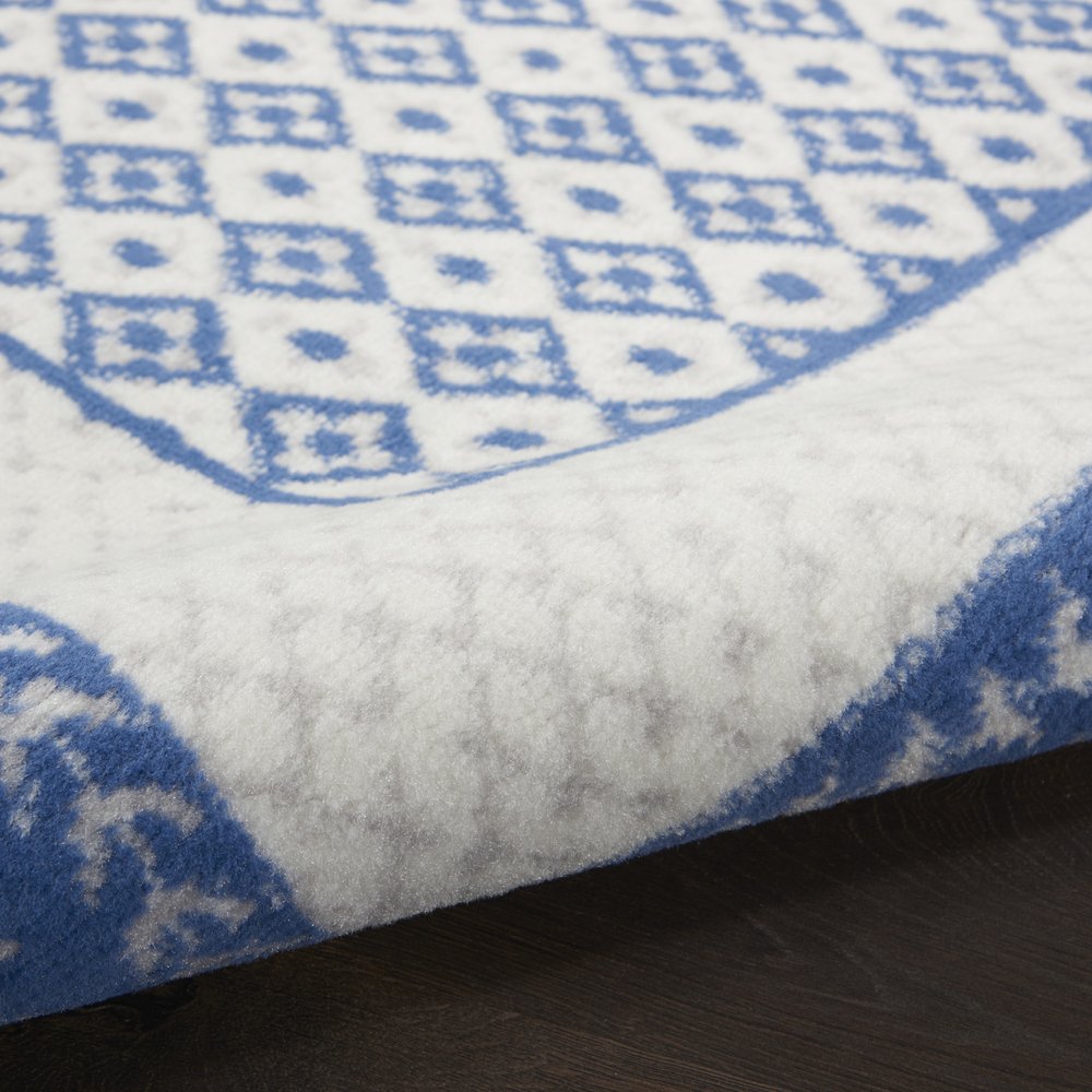 5' X 7' Ivory And Blue Geometric Area Rug