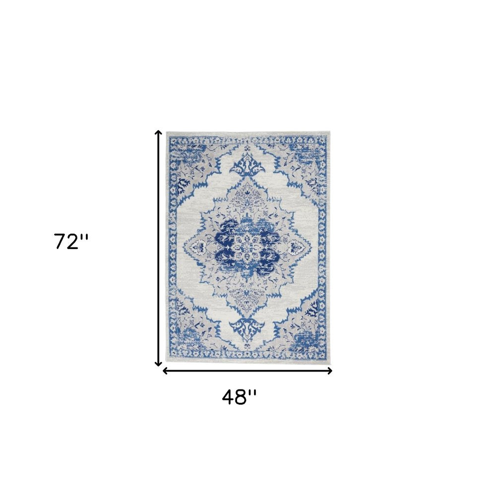 5' X 7' Ivory And Blue Medallion Area Rug