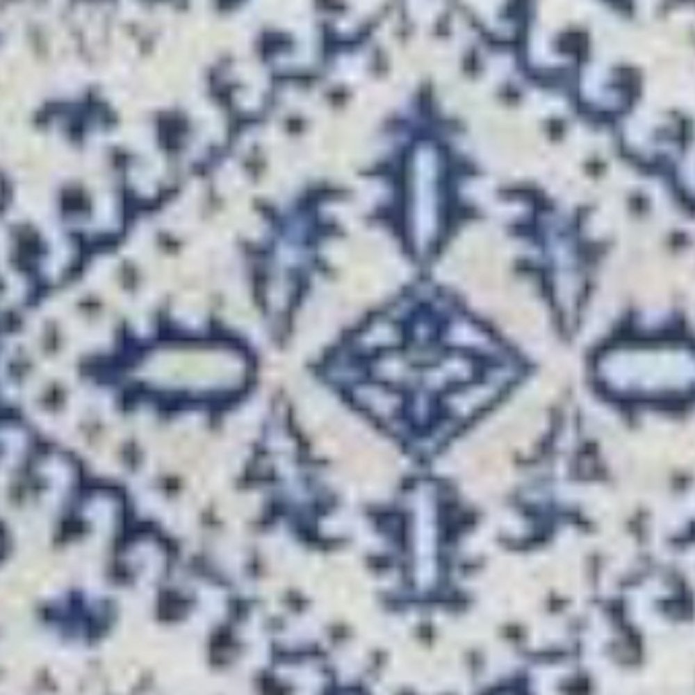 6' X 9' Ivory And Blue Geometric Distressed Area Rug