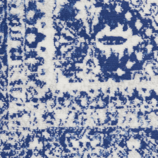 6' X 9' Ivory And Blue Geometric Distressed Area Rug