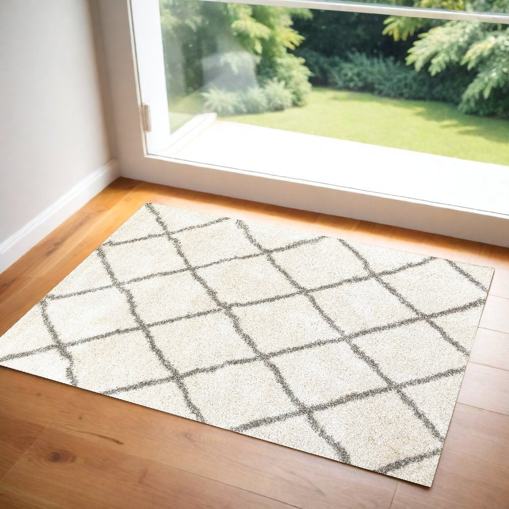 8' X 11' Ivory And Gray Geometric Lattice Area Rug