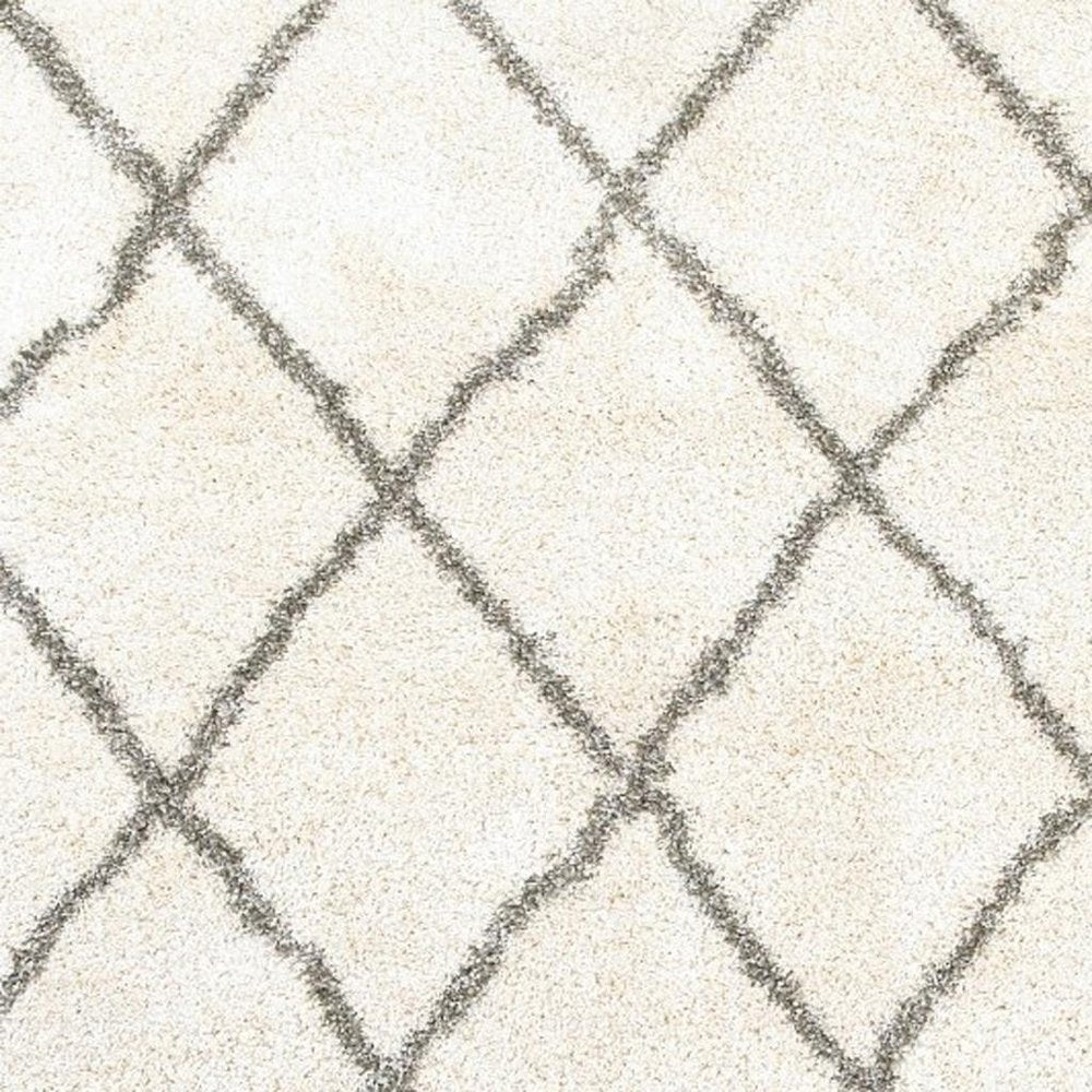 8' X 11' Ivory And Gray Geometric Lattice Area Rug
