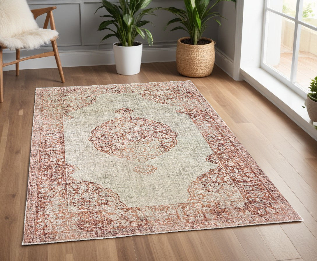 10' X 13' Ivory And Pink Medallion Area Rug