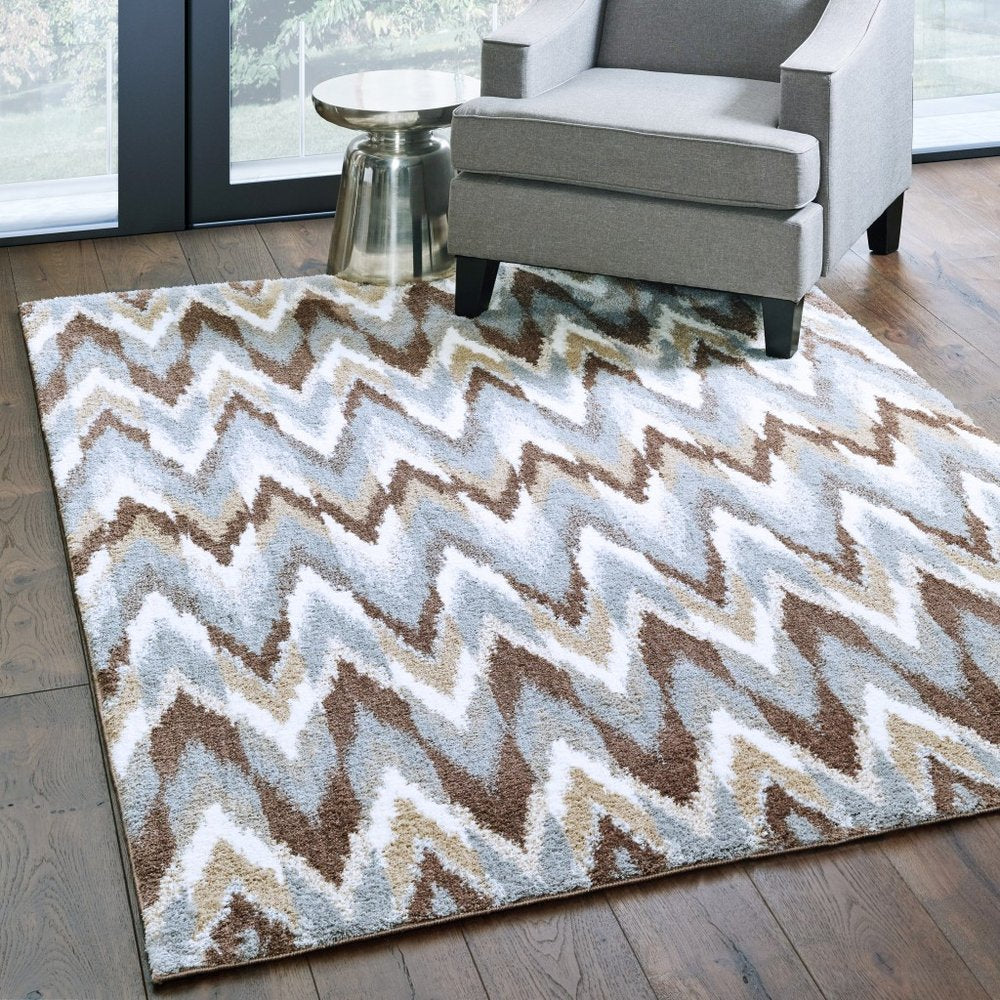 7' X 10' Gray And Taupe Ikat Pattern Area Rug