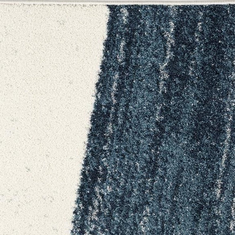 5' X 8' White And Blue Abstract Strokes Area Rug