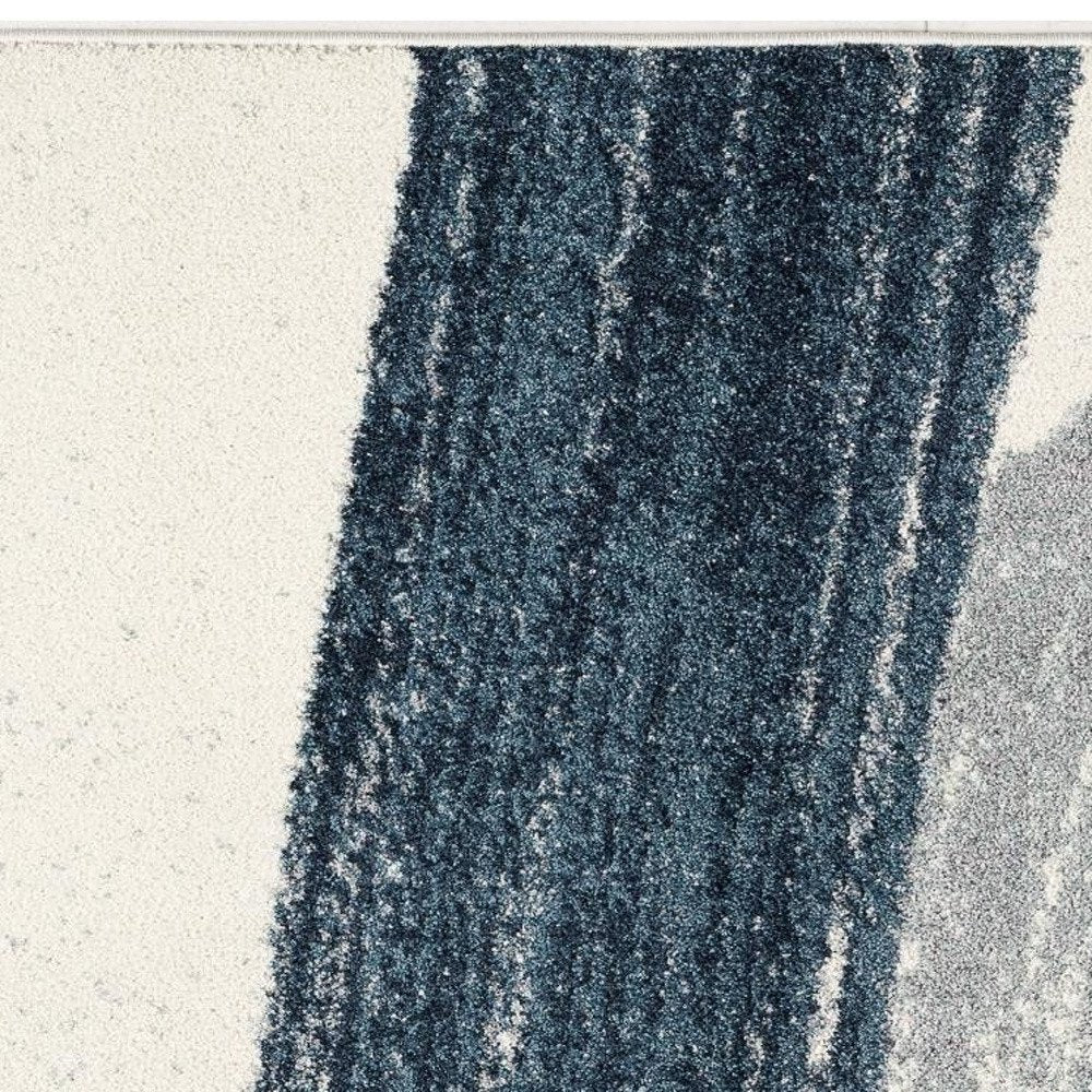 5' X 8' White And Blue Abstract Strokes Area Rug