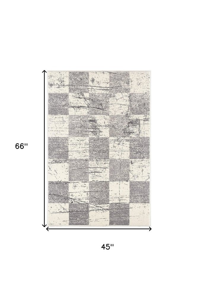 5' X 8' White And Gray Checkered Area Rug