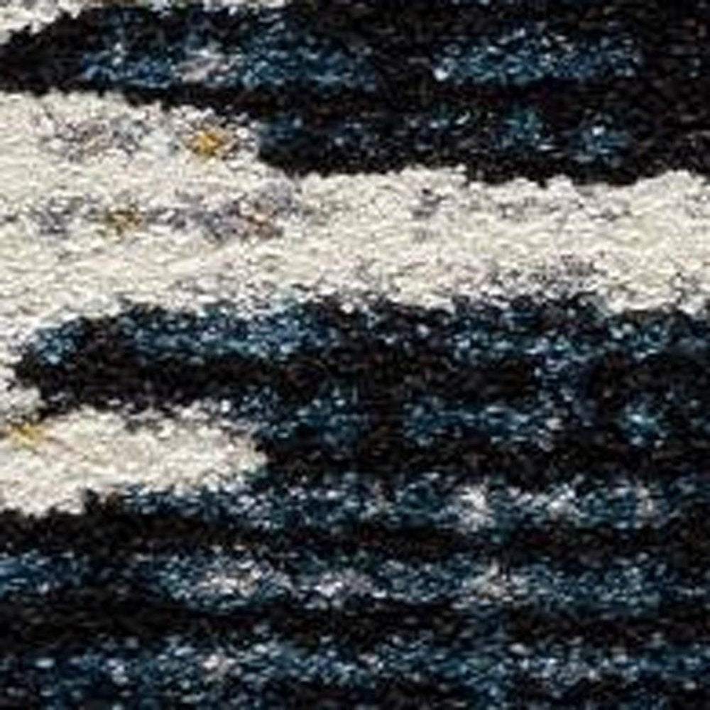 8' X 11' Blue And Ivory Abstract Area Rug