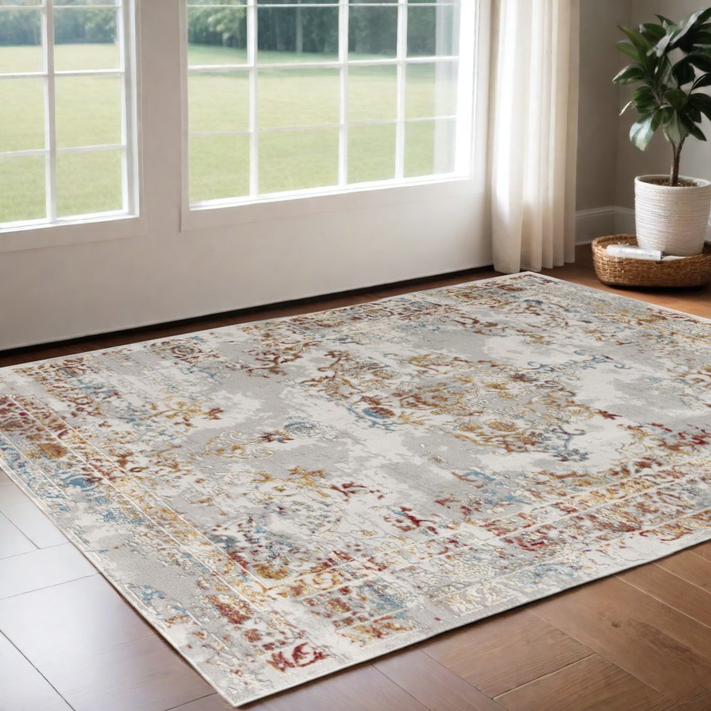 4' X 6' Gray And Beige Distressed Ornate Area Rug