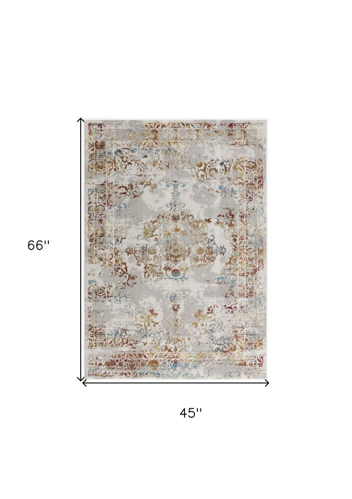 4' X 6' Gray And Beige Distressed Ornate Area Rug