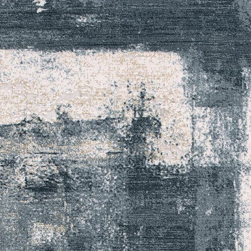 8' X 11' Cream And Blue Abstract Patches Area Rug