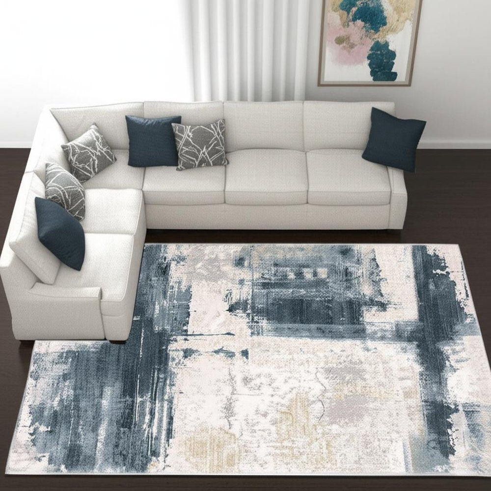 8' X 11' Cream And Blue Abstract Patches Area Rug