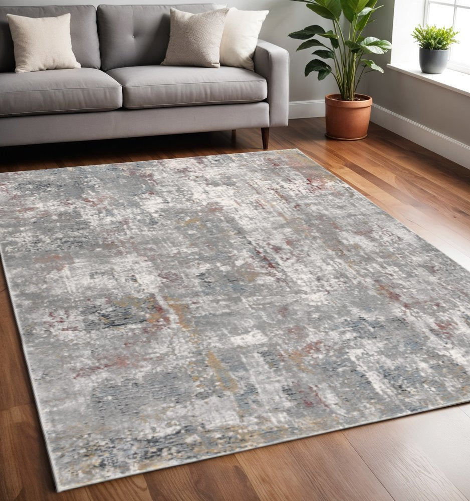 5' X 8' Gray And Ivory Abstract Area Rug