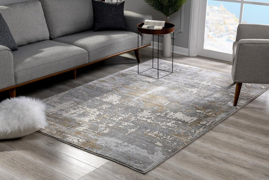 7' X 10' Beige And Gray Distressed Area Rug