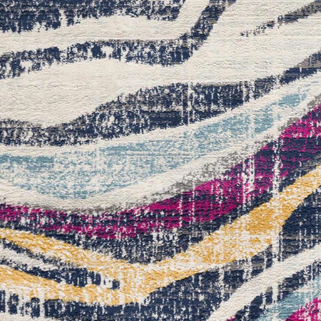 2' X 4' Blue and Gold Abstract Area Rug