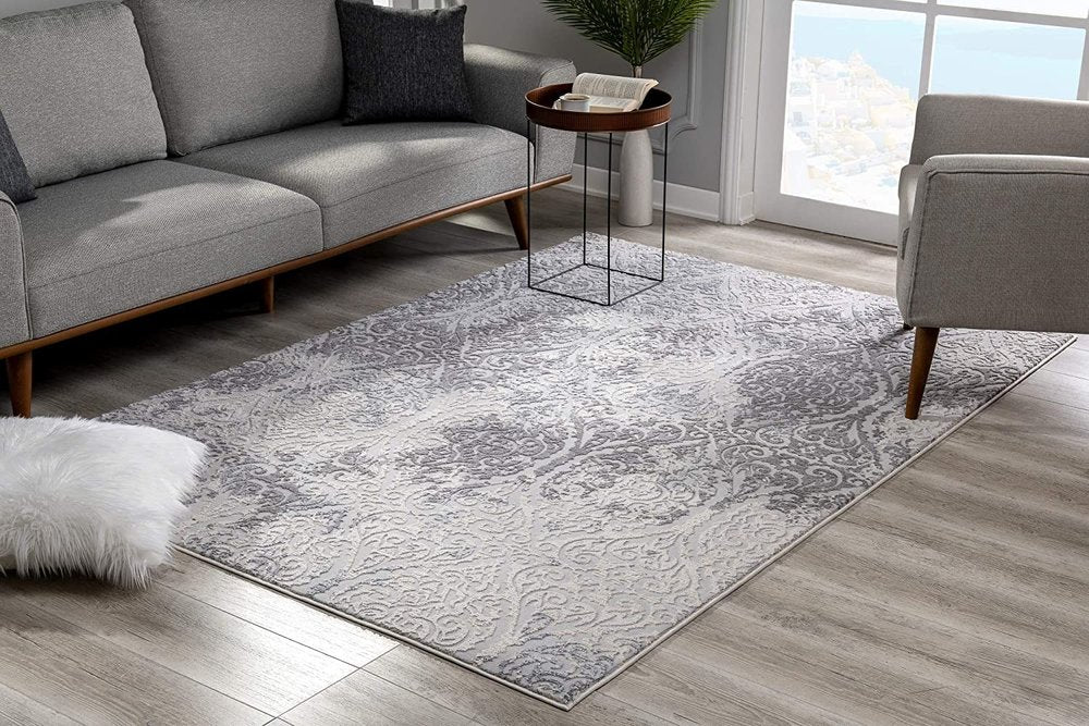 7' X 10' Cream And Gray Tinted Ogee Pattern Area Rug