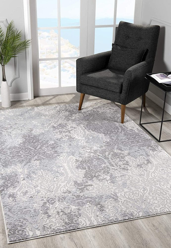 7' X 10' Cream And Gray Tinted Ogee Pattern Area Rug